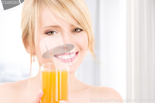 Image of lovely girl with glass of juice