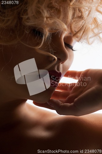 Image of beautiful woman with long hair