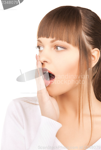 Image of woman with hand over mouth