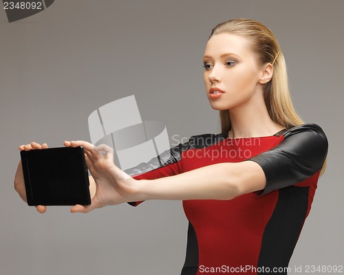 Image of futuristic woman with tablet pc