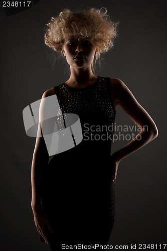 Image of woman in black dress