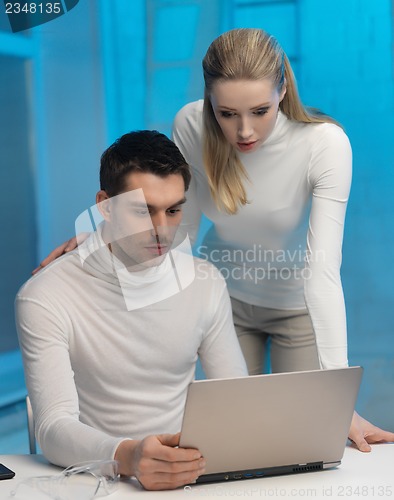 Image of man and woman in laboratory