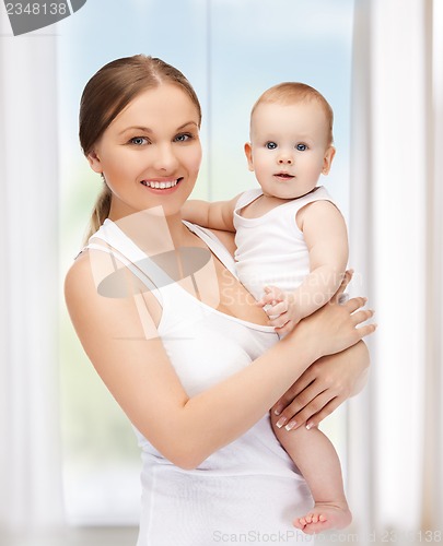 Image of happy mother with adorable baby