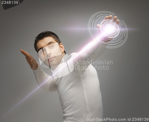 Image of man working with virtual screen