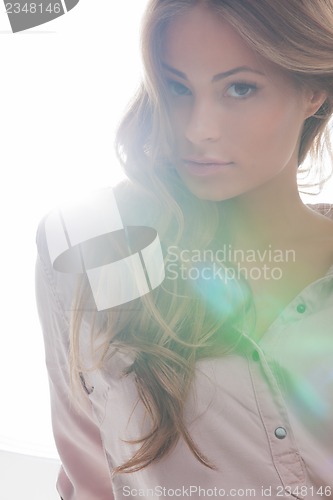 Image of beautiful woman in casual clothes