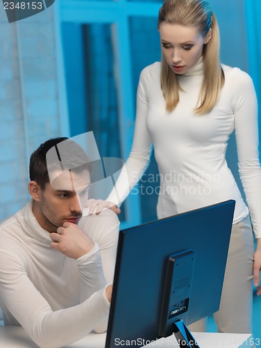 Image of man and woman in laboratory