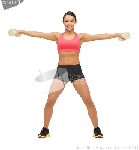 Image of woman with dumbbells