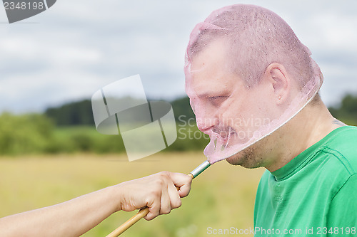 Image of Caught man with a butterfly net