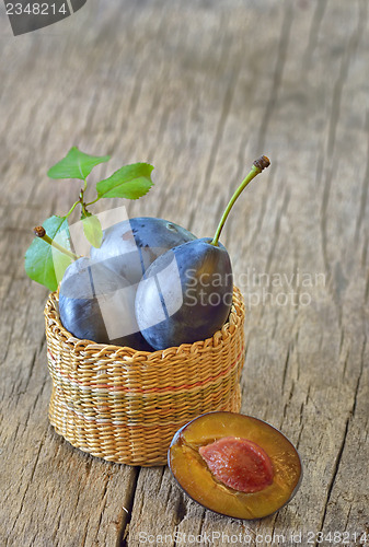 Image of basket with plums