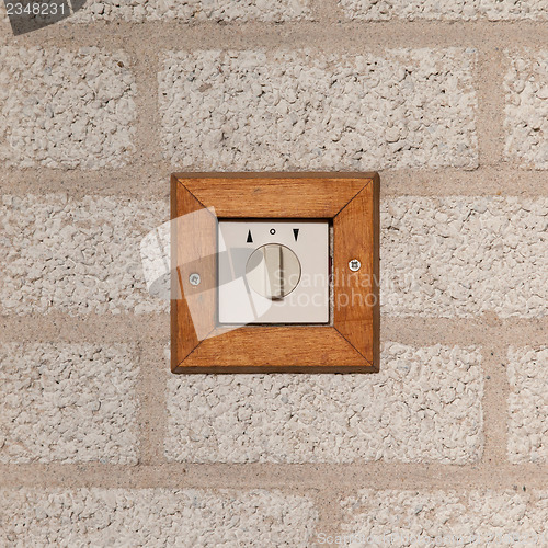 Image of Old switch on a stone wall
