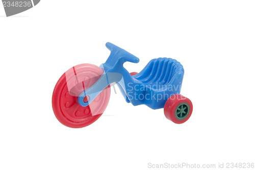 Image of Small blue tricycle toy