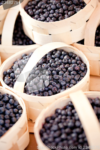 Image of healthy fresh blueberries macro closeup on market outdoor