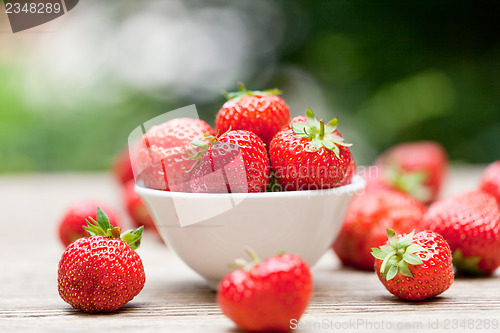 Image of fresh tasty sweet strawberries macro closeup garden outdoor