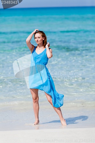 Image of beautful happy woman on the beach lifestyle summertime