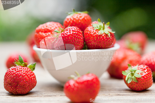 Image of fresh tasty sweet strawberries macro closeup garden outdoor