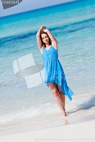 Image of beautful happy woman on the beach lifestyle summertime
