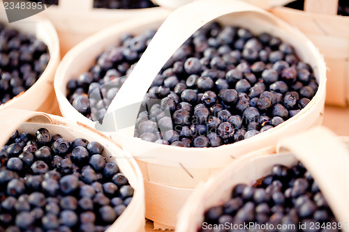 Image of healthy fresh blueberries macro closeup on market outdoor