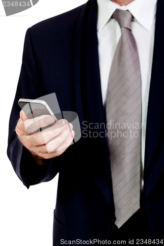 Image of adult businessman with smartphone mobilephone isolated