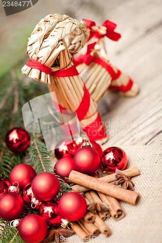 Image of christmas decoration cinnamon anise baubles in red 