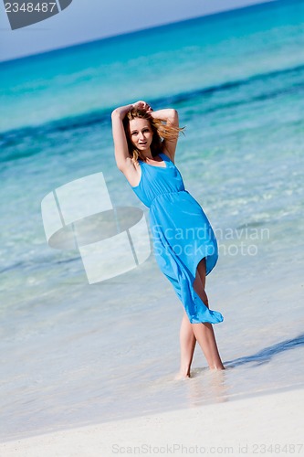Image of beautful happy woman on the beach lifestyle summertime