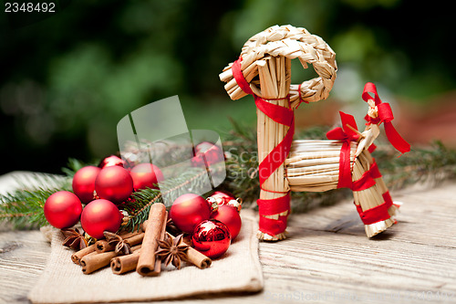 Image of christmas decoration cinnamon anise baubles in red 