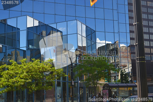 Image of Reflections in glass buildings.