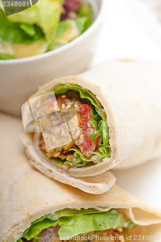 Image of falafel pita bread roll wrap sandwich