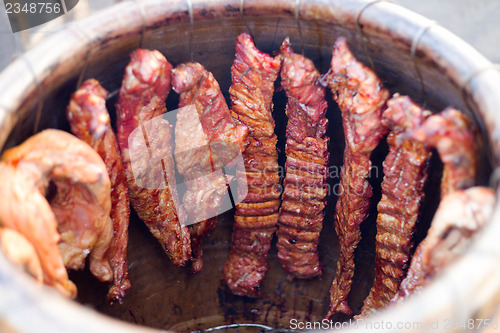 Image of grilled pork ribs on bbq grill with a shallow DOF