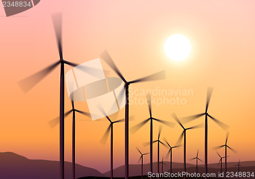 Image of wind turbines on hight sky