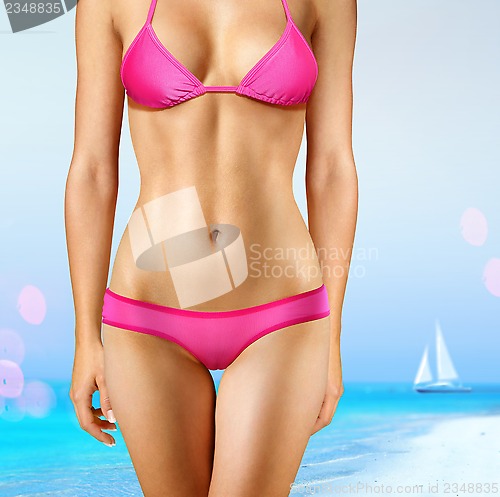 Image of woman in pink bathing suit