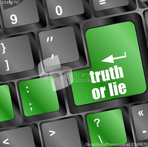 Image of truth or lie button on computer keyboard key