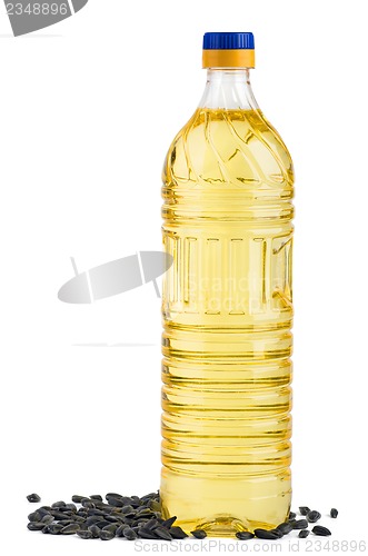 Image of Bottle of sunflower oil and seeds near