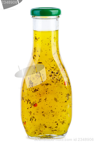 Image of Glass bottle with italian sauce