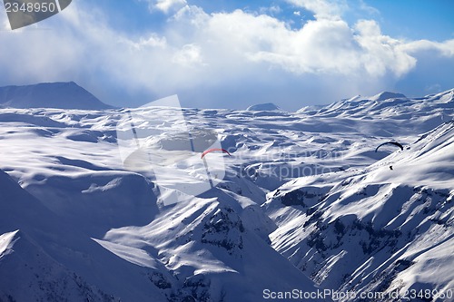 Image of Speed flying in winter mountains