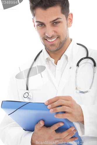 Image of Young handsome male doctor with a file