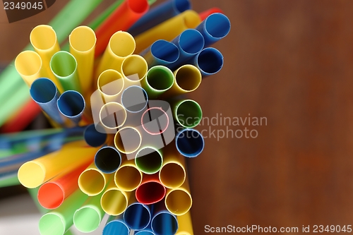Image of Colorful straws in a bar
