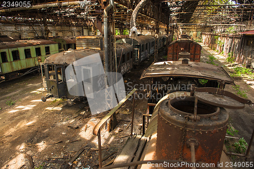 Image of Cargo trains in old train depot