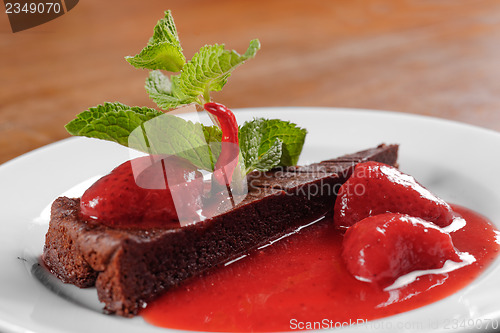 Image of Chocolate cake wth strawberry and chili