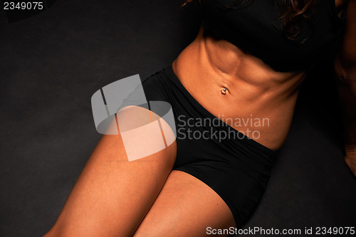 Image of Legs and abdomen of a beautiful woman