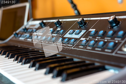 Image of Closeup photo of an audio mixer