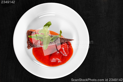 Image of Chocolate cake wth strawberry and chili
