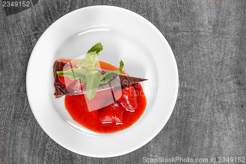 Image of Chocolate cake wth strawberry and chili