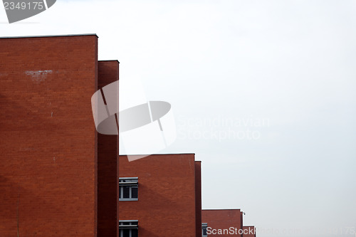Image of Red brick wall with sky