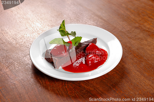 Image of Chocolate cake wth strawberry and chili