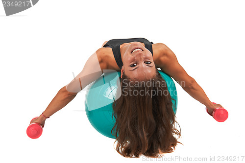 Image of Young woman with sport gymnastic ball