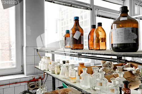 Image of Photo of an old laboratory with a lot of bottles