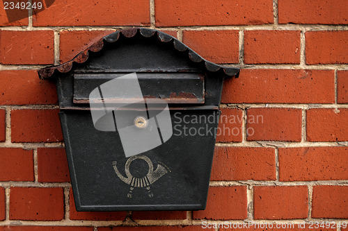Image of Vintage postbox on brick wall