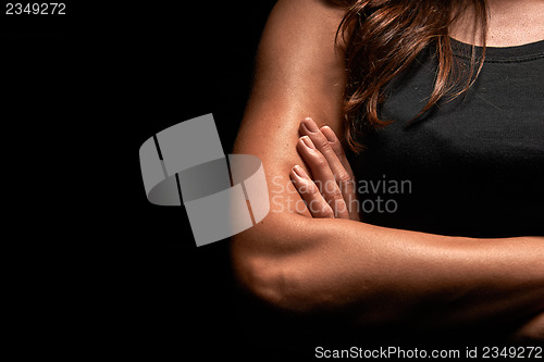 Image of Upper body of a muscular woman