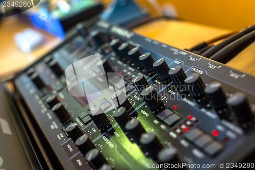 Image of Closeup photo of an audio mixer