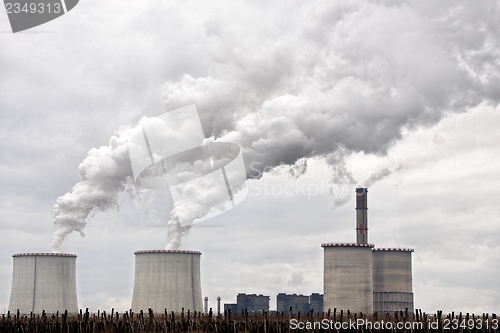 Image of Modern power plant exhausting large amount of vapor